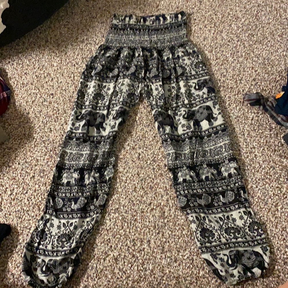 Goucho like pants. Aztec design. Go high up.